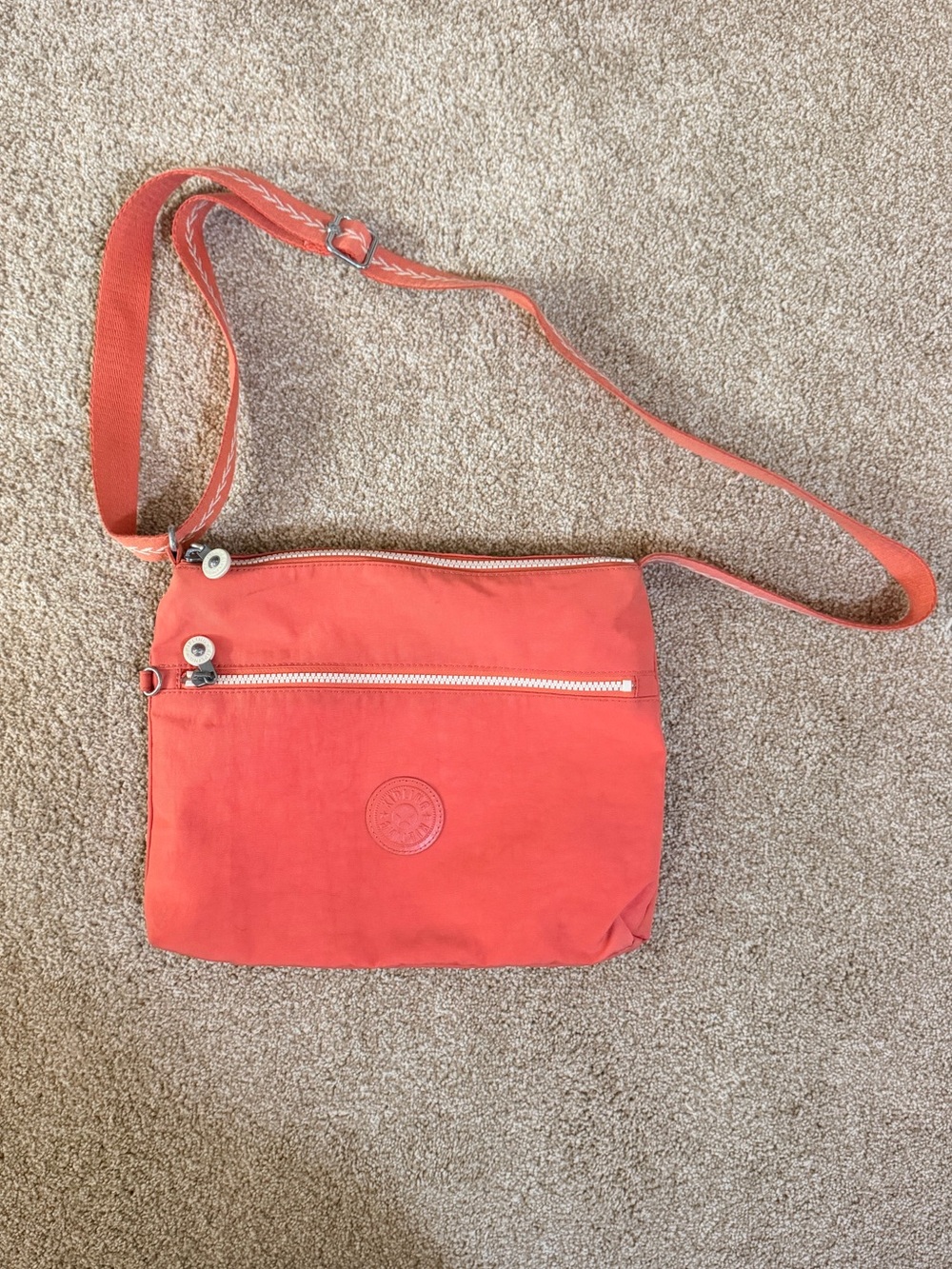 Kipling Coral-Red Crossbody Bag with Front Zip Pocket